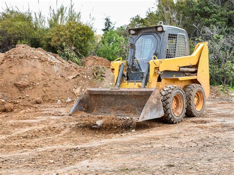 a skid steer loader|skid steer loader definition.